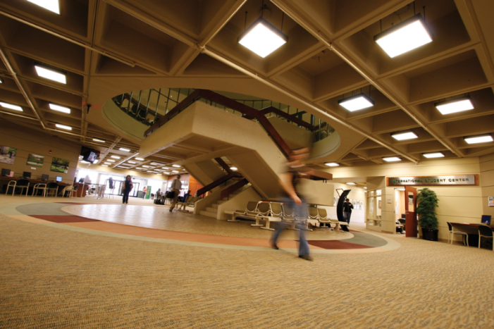 student walking in Student Center lobby student walking in Student Center lobby